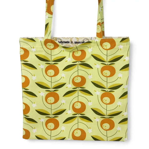 mmb by hand organic cotton tote bag in light green with orange citrus fruit pattern and handmade in savannah label